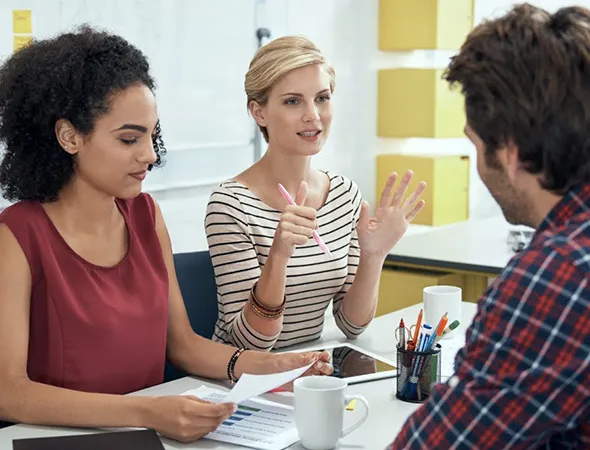 Partners practicing conflict resolution techniques during a coaching session