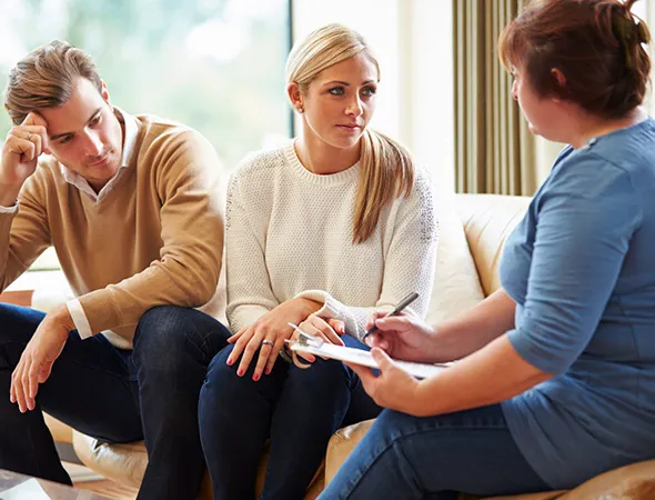 Married couple reconnecting emotionally through marriage coaching