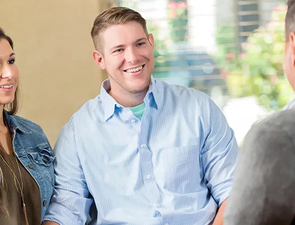 Engaged couple practicing communication skills before marriage